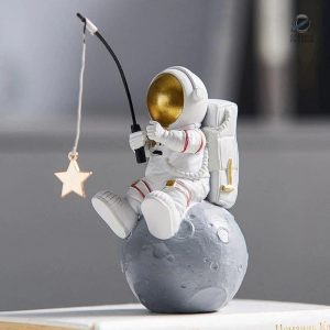 Figurine Astronaute décorative à la pêche aux étoiles