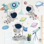 Stickers muraux illustrant des astronautes dans l'espace