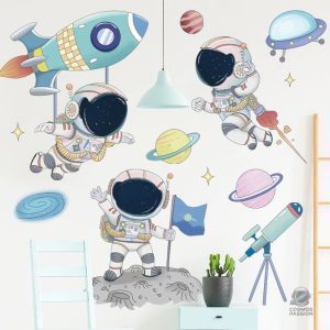 Stickers muraux illustrant des astronautes dans l'espace